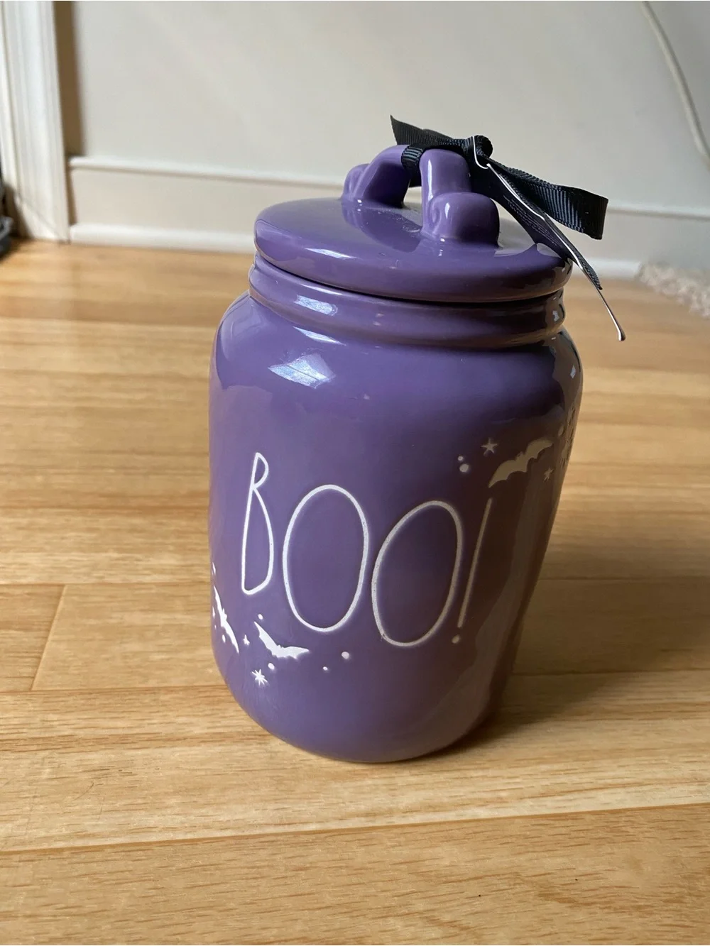 2024 Rae Dunn BOO baby ceramic Halloween canister featuring white bat and stars